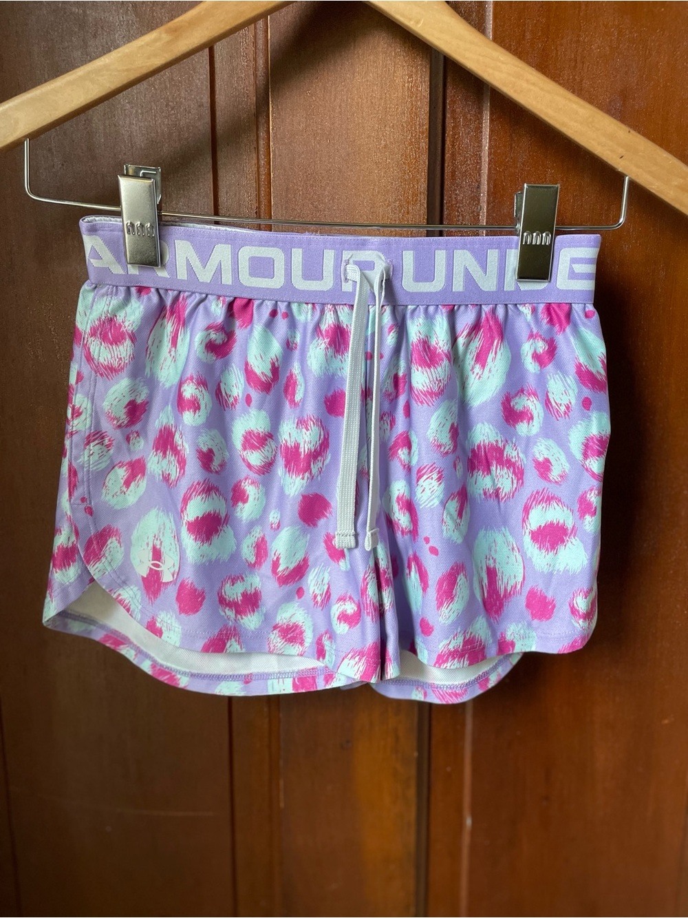 Under Armour girls youth medium purple print athletic shorts